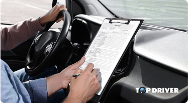 adult student practicing behind the wheel with certified instructor